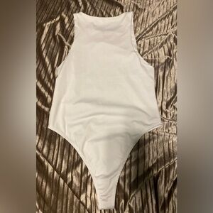 Women’s white body suite